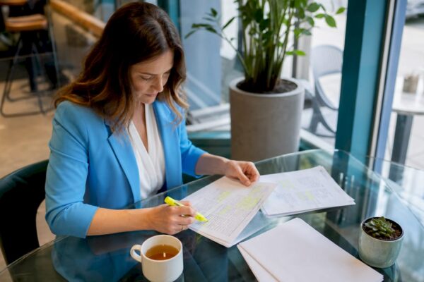 Mental health expert reviewing PR strategy notes