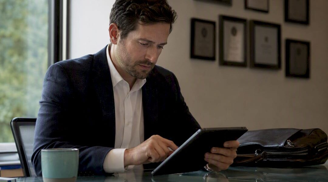Lawyer organizing nomination on tablet
